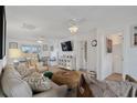 Open concept living space with hardwood floors and coastal decor at 147 Anglers Dr., Murrells Inlet, SC 29576