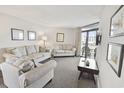 Living room features comfortable seating and ocean view at 201 74Th Ave. N # 701, Myrtle Beach, SC 29572