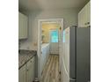 Laundry room with washer, dryer, and exterior access at 209 Cedar St. # C-4, Myrtle Beach, SC 29577