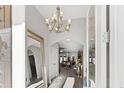 Bright entryway with chandelier and large mirror at 2305 Ameron Ct., North Myrtle Beach, SC 29582