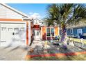 Front entry with decorative landscaping and lighting at 2305 Ameron Ct., North Myrtle Beach, SC 29582