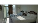 Bedroom with two double beds, ocean view, and balcony access at 2504 N Ocean Blvd. # 1733, Myrtle Beach, SC 29577
