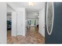 Home entryway with tiled floor and view into living room at 3348 Merganser Dr., Conway, SC 29527