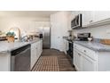 Modern kitchen featuring stainless steel appliances and granite countertops at 528 Duvall St., Longs, SC 29568