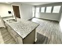 Modern kitchen with granite countertops and stainless steel appliances at 5905 S Kings Hwy. # 4112, Myrtle Beach, SC 29575