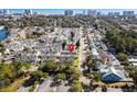 Aerial view shows the community close to the ocean, various businesses, and lake at 618 3Rd Ave. S # 4D, North Myrtle Beach, SC 29582