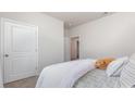 Cozy bedroom with a plush bed and neutral color scheme at 7350 Meadow Walk Loop, Loris, SC 29569