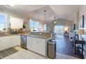 Modern kitchen with stainless steel appliances and a breakfast bar at 804 Crumpet Ct. # 1151, Myrtle Beach, SC 29579
