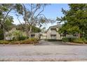 Attractive building entrance with landscaping at 107 Toby Ct. # 203-B, North Myrtle Beach, SC 29582