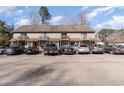 Front view of a multi-unit building with parking at 115 Horizon River Dr. # 8D, Myrtle Beach, SC 29588