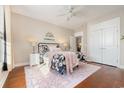 Bedroom with floral bedding, nightstands, and double doors at 1536 Suncrest Dr., Myrtle Beach, SC 29577