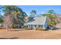 Cute house with a spacious yard and boat in view at 16 Johnstone Ln., Georgetown, SC 29440