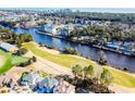 Stunning aerial view of waterfront property with golf course at 2117 Mirabel Ct., North Myrtle Beach, SC 29582