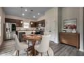 Kitchen with granite countertops and dark brown cabinets at 352 High Falls Dr., Conway, SC 29526