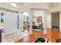 Elegant dining room with hardwood floors and chandelier at 402 Ocean Pointe Ct., North Myrtle Beach, SC 29582