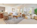 Cozy living room featuring a comfortable seating arrangement and ample natural light at 4384 Daphne Ln. # H, Murrells Inlet, SC 29576