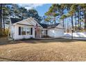 Inviting single-story home showcasing a cozy facade and neat landscaping at 5933 Rahnavard Blvd., Myrtle Beach, SC 29588