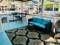 Covered porch with seating area overlooking neighborhood at 6001-1655 South Kings Hwy., Myrtle Beach, SC 29575