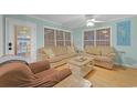 Living room with two sofas, coffee table, and light blue walls at 6001-1709 South Kings Hwy., Myrtle Beach, SC 29575