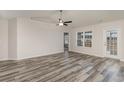 Spacious living room featuring wood-look floors and lots of natural light at 640 Woodside Dr., Conway, SC 29526