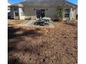 Backyard patio with seating area, ideal for outdoor dining at 803 Sultana Dr., Little River, SC 29566