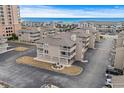 Aerial view showcasing building's location near ocean and other buildings at 1801 N Ocean Blvd. # F-1, North Myrtle Beach, SC 29582