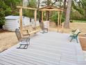 Backyard deck with swing, seating, pergola, and storage shed at 187 Stephen Dr., Hemingway, SC 29554