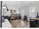 Home office with built-in shelving and plenty of natural light at 2360 Goldfinch Dr., Myrtle Beach, SC 29577