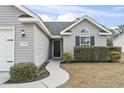 House exterior with walkway leading to front door at 293 Foxpath Loop, Myrtle Beach, SC 29588