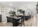 Open concept dining area with dark wood table and bench at 331 Golan Circle # A, Myrtle Beach, SC 29579