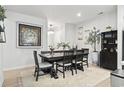 Elegant dining room with dark wood table and large clock art at 331 Golan Circle # A, Myrtle Beach, SC 29579