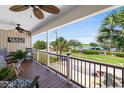 Porch with rocking chairs and a scenic water view, perfect for relaxation at 403 36Th Ave. N, North Myrtle Beach, SC 29582