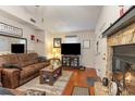 Comfortable living room with fireplace and hardwood floors at 4306 Princeton Dr., Little River, SC 29566