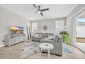 Spacious living room featuring a cozy sectional sofa and large TV at 520 Shellbark Dr., Longs, SC 29568