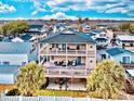 Two-story home with large deck and backyard, near ocean at 6001 - 6004 S Kings Hwy., Myrtle Beach, SC 29575