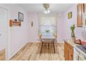 Small dining area with light wood flooring and a table for two at 601 37Th Ave. N # C, Myrtle Beach, SC 29577