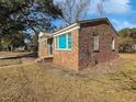 Side view of brick ranch house at 602 Olive St., Georgetown, SC 29440