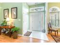 Bright entryway with tile floor and access to other rooms at 6925 Ashley Cove Dr., Myrtle Beach, SC 29588