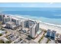 High rise condo building near beach, with parking and other buildings at 7100 N Ocean Blvd. # 320, Myrtle Beach, SC 29572