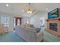 Bright living room with hardwood floors and view of dining area at 7570 Johnson Rd., Myrtle Beach, SC 29588