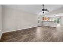 Living room with hardwood floors and kitchen view at 869 Silvercrest Dr., Myrtle Beach, SC 29579