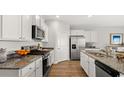 Modern kitchen featuring stainless steel appliances and granite countertops at 120 Shucking St., Myrtle Beach, SC 29588