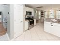 Kitchen with white cabinets, granite countertops, and stainless steel appliances at 1392 Southwood Dr., Surfside Beach, SC 29575