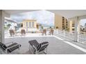 Ocean view deck with chairs and tables at 1524 S Ocean Blvd. S # Penthouse, North Myrtle Beach, SC 29582