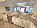 Kitchen with granite countertops and stainless steel appliances at 2007 S Ocean Blvd. # 1607, Myrtle Beach, SC 29577