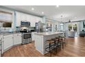 Modern kitchen with stainless steel appliances and an island at 4918 Old Appleton Way, North Myrtle Beach, SC 29582