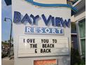 Bayview Resort sign with a beach-themed message welcoming guests at 504 N Ocean Blvd. # 1003, Myrtle Beach, SC 29577