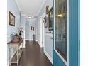 Bright entryway with hardwood floors and decorative console table at 5522 Elba Way # 5522, Myrtle Beach, SC 29579