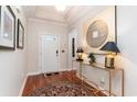 Bright and airy entryway with hardwood floors and decorative accents at 6244 Catalina Dr. # 1411, North Myrtle Beach, SC 29582