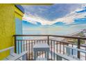 Stunning ocean view from a condo balcony, with chairs and table at 6804 N Ocean Blvd. # 1637, Myrtle Beach, SC 29572